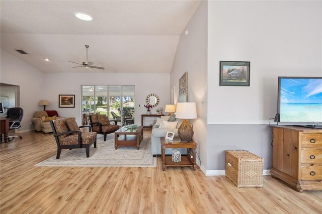 4730 SAWGRASS LAKE CIRCLE, Leesburg, FL 34748