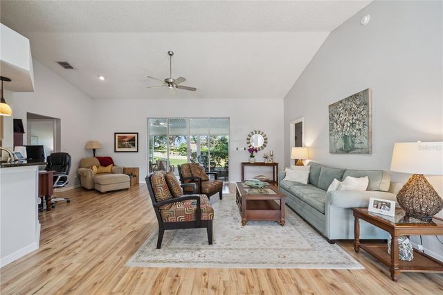 4730 SAWGRASS LAKE CIRCLE, Leesburg, FL 34748