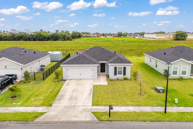 177 Dabou Loop, Belle Glade, FL 33430