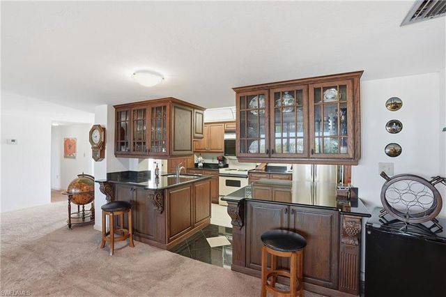 11 Bluebill AVE # 203, Naples, FL 34108