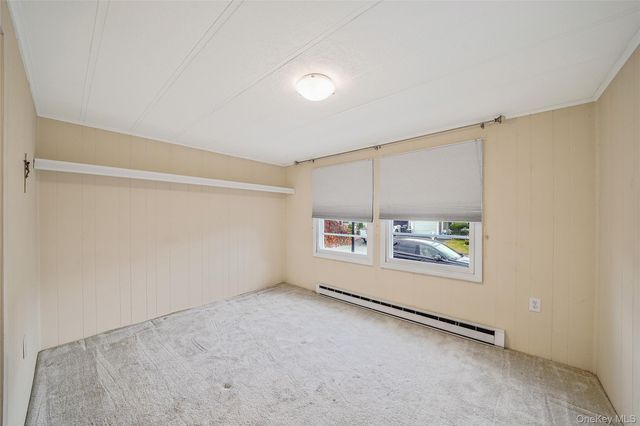 91 Village Circle W, Manorville, NY 11949