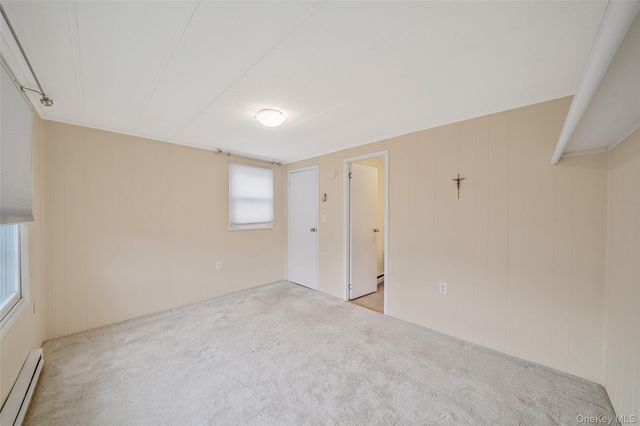 91 Village Circle W, Manorville, NY 11949