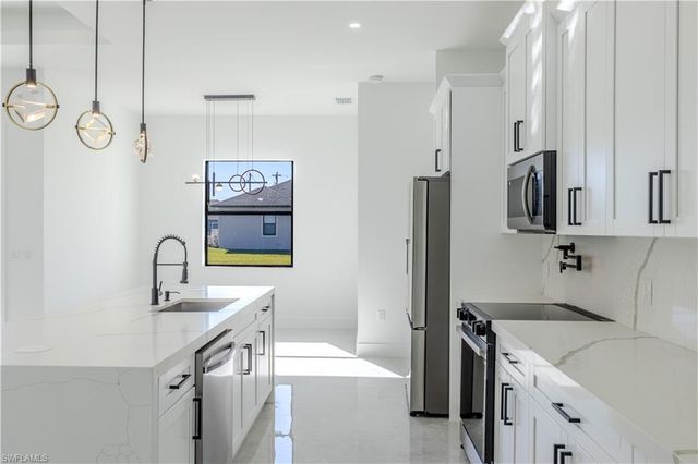 3303 24 ST SW, Lehigh Acres, FL 33976