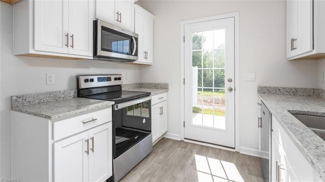 810 Gaelic Drive, Gibsonville, NC 27249