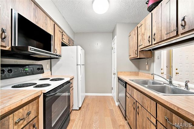 6803 Cottage Grove Lane F, Oakville, MO 63129