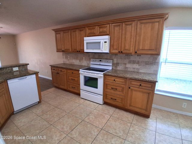 660 Wickham Lakes Drive, Melbourne, FL 32940