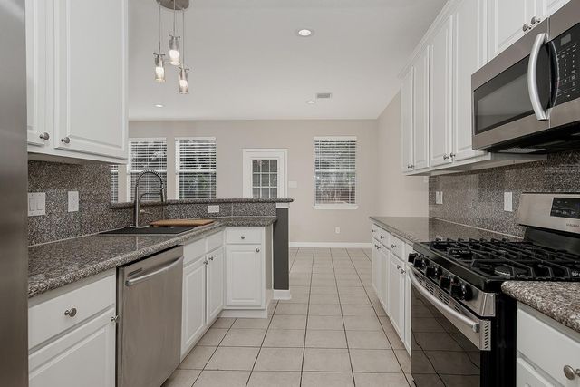 11 Scenic Brook Court, The Woodlands, TX 77382