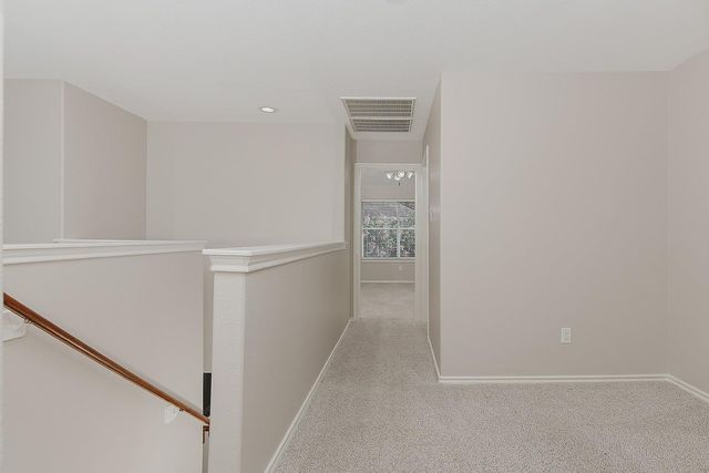 11 Scenic Brook Court, The Woodlands, TX 77382