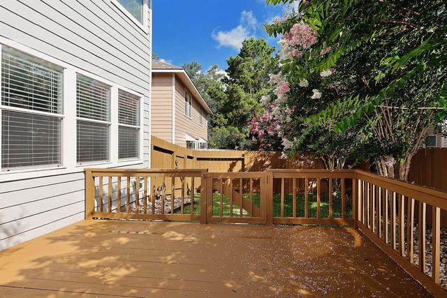 11 Scenic Brook Court, The Woodlands, TX 77382