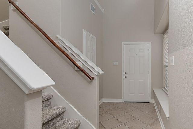 11 Scenic Brook Court, The Woodlands, TX 77382