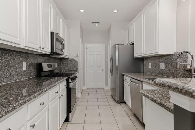 11 Scenic Brook Court, The Woodlands, TX 77382