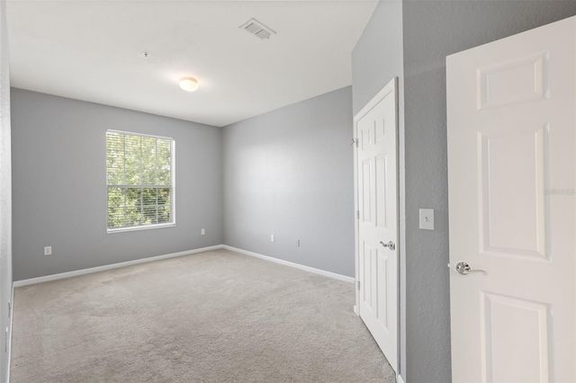 8775 SARTORI STREET 303, Orlando, FL 32829