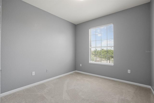8775 SARTORI STREET 303, Orlando, FL 32829