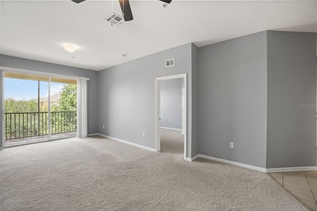 8775 SARTORI STREET 303, Orlando, FL 32829