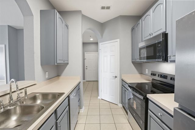 8775 SARTORI STREET 303, Orlando, FL 32829