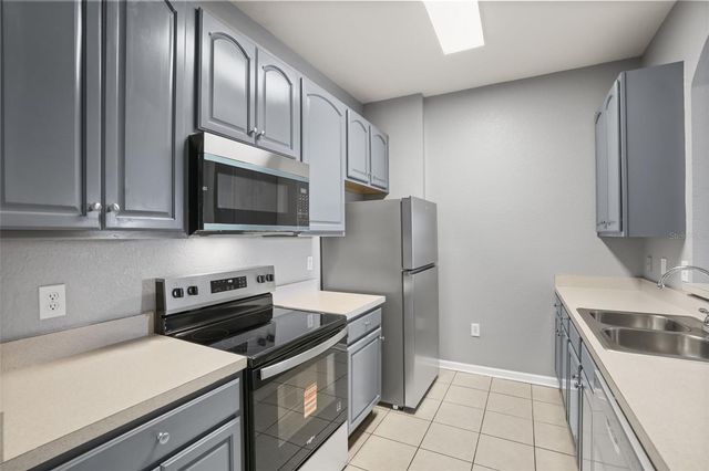 8775 SARTORI STREET 303, Orlando, FL 32829