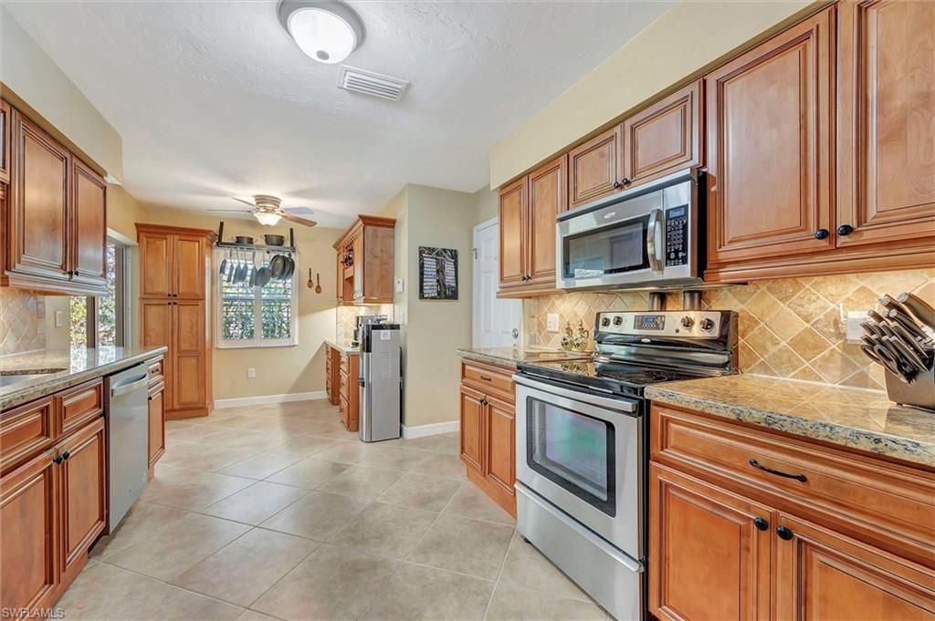 715 96th AVE N, NAPLES, FL 34108 — photo 5