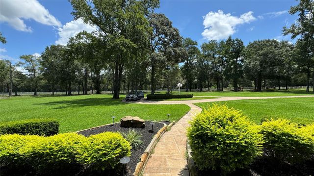 15216 Saddlewood Drive, Conroe, TX 77384