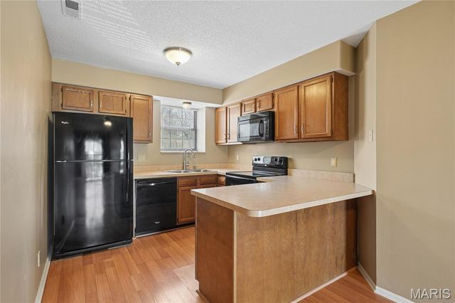 2303 Yosemite Park Ct Court C, Maryland Heights, MO 63043