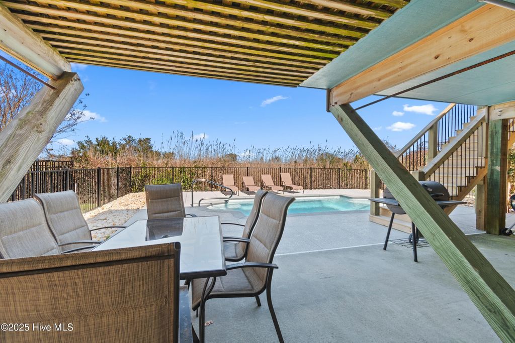 Image 3 of property listing at 108 Caswell Beach Road, Oak Island, NC 28465