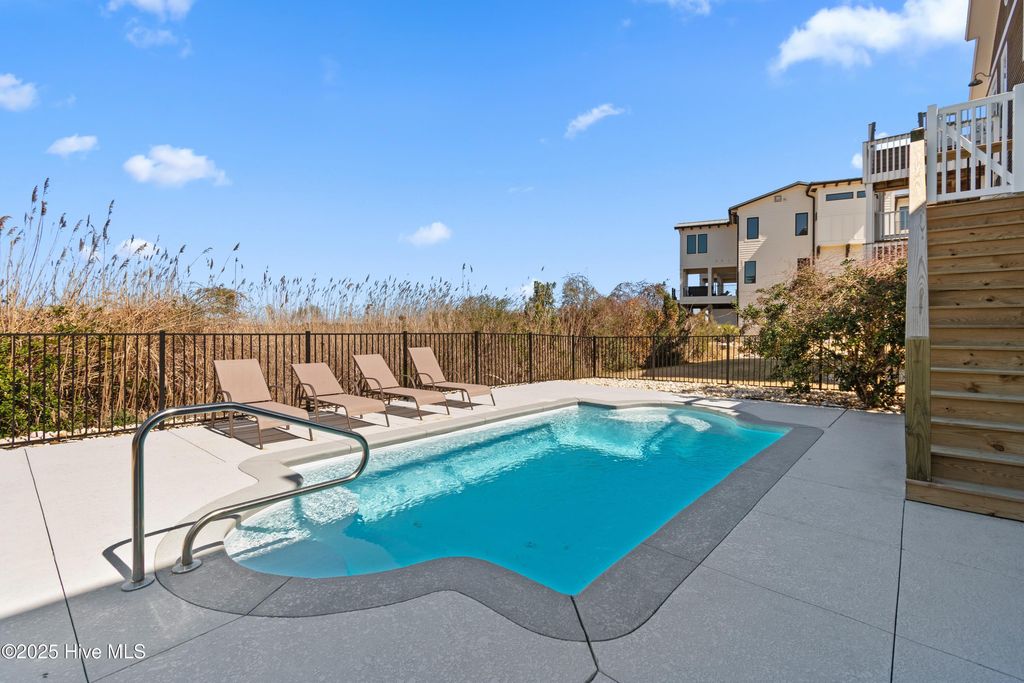 Image 4 of property listing at 108 Caswell Beach Road, Oak Island, NC 28465