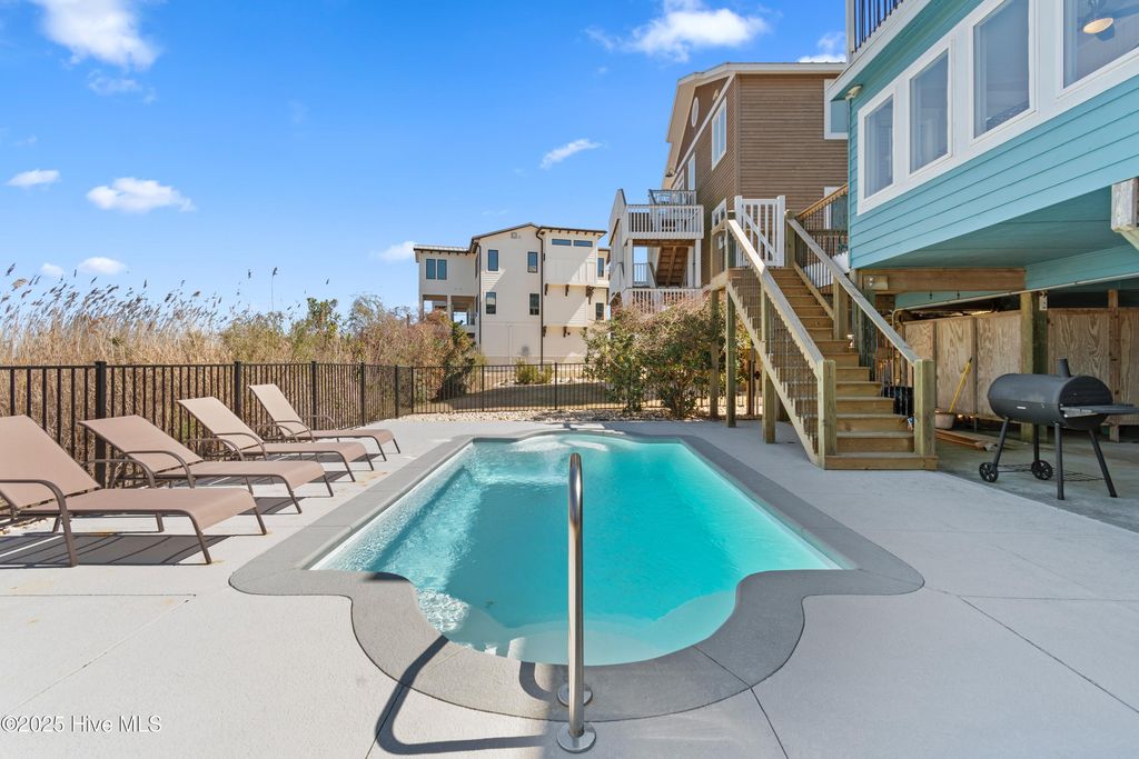 Image 5 of property listing at 108 Caswell Beach Road, Oak Island, NC 28465