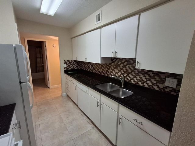 899 Riverside Drive 613, Coral Springs, FL 33071