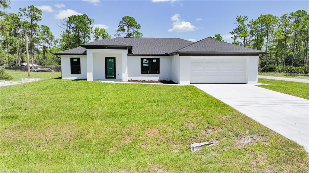 1407 E 15th ST, LEHIGH ACRES, FL 33972 — exterior