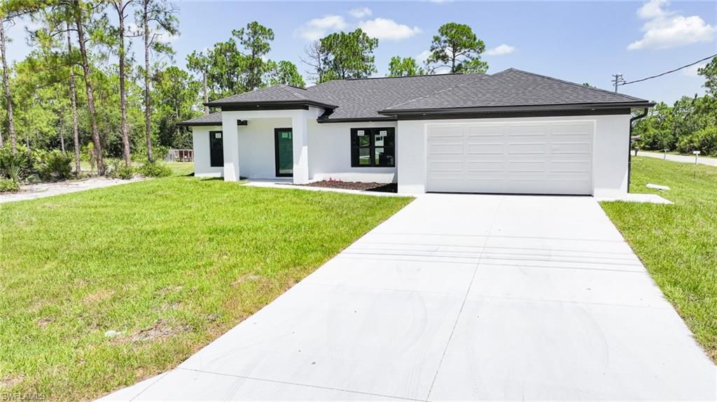 1407 E 15th ST, LEHIGH ACRES, FL 33972 — photo 2