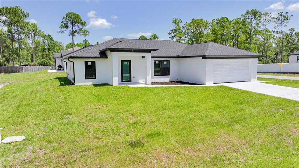 1407 E 15th ST, LEHIGH ACRES, FL 33972 — photo 3
