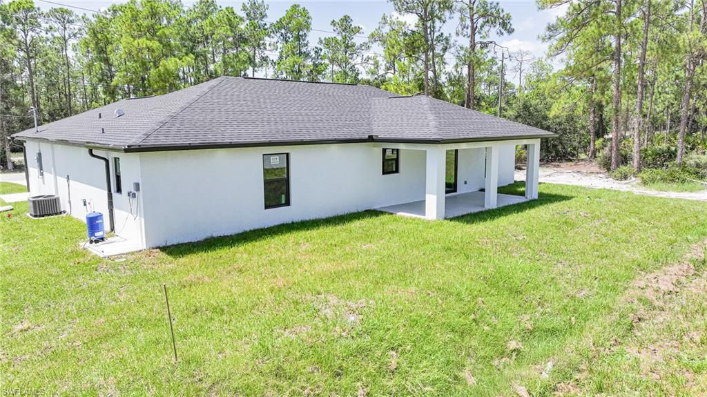 1407 E 15th ST, LEHIGH ACRES, FL 33972 — photo 4