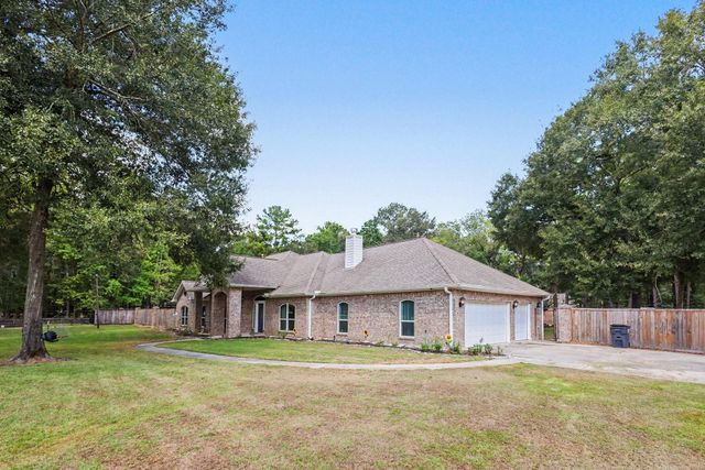 911 Winchester Bend, Huffman, TX 77336