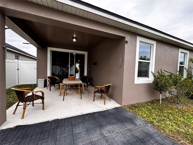 4976 MILLENNIA GREEN DRIVE, Orlando, FL 32811