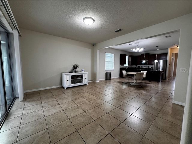 4976 MILLENNIA GREEN DRIVE, Orlando, FL 32811