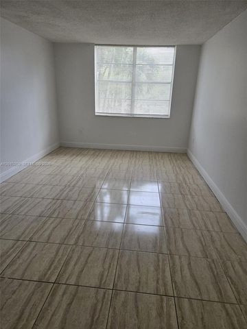 496 NW 165th St Rd D-210, Miami, FL 33169