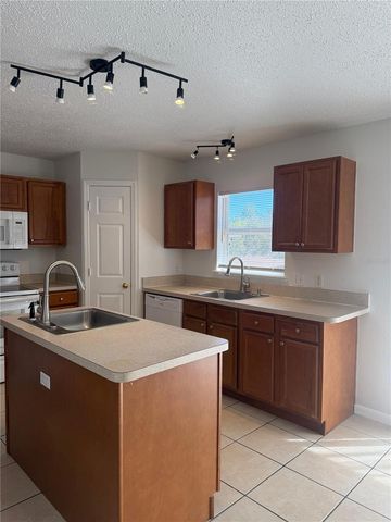 1902 HURON WAY, Poinciana, FL 34759