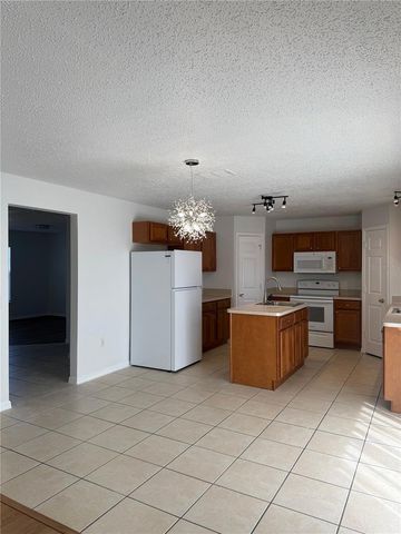 1902 HURON WAY, Poinciana, FL 34759