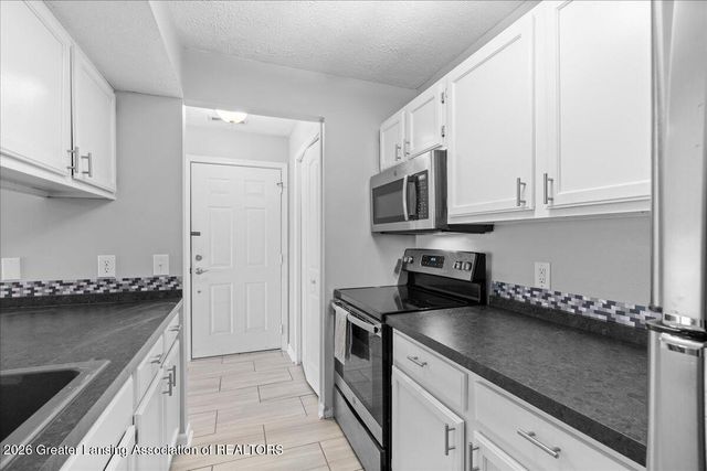 607 Carom Circle, Mason, MI 48854
