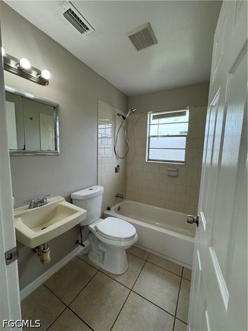 1112 Gifford AVE S, Lehigh Acres, FL 33936