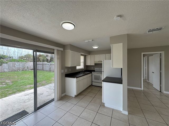 1112 Gifford AVE S, Lehigh Acres, FL 33936