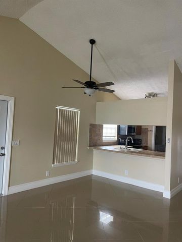 1534 ROYAL FOREST Court, Palm Springs, FL 33406