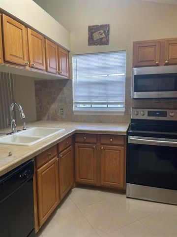 1534 ROYAL FOREST Court, Palm Springs, FL 33406