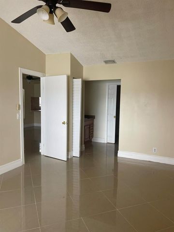 1534 ROYAL FOREST Court, Palm Springs, FL 33406