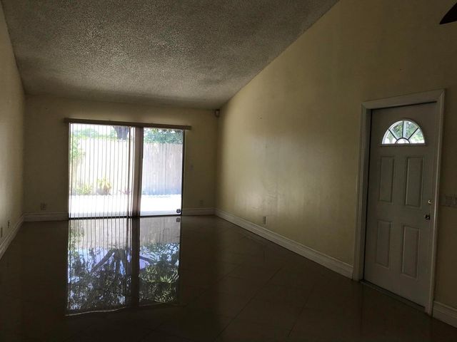 1534 ROYAL FOREST Court, Palm Springs, FL 33406
