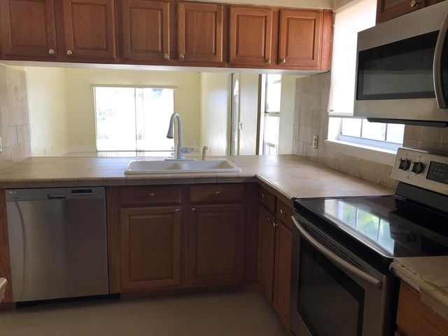 1534 ROYAL FOREST Court, Palm Springs, FL 33406