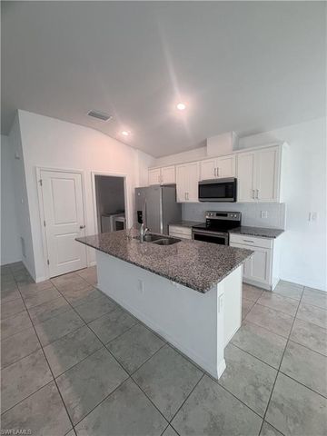 328 Jacaranda PKWY E, Cape Coral, FL 33909