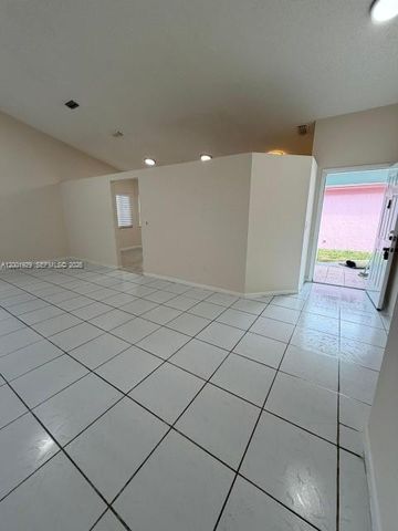 1034 W Jasmine Ln, North Lauderdale, FL 33068