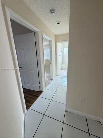 1034 W Jasmine Ln, North Lauderdale, FL 33068