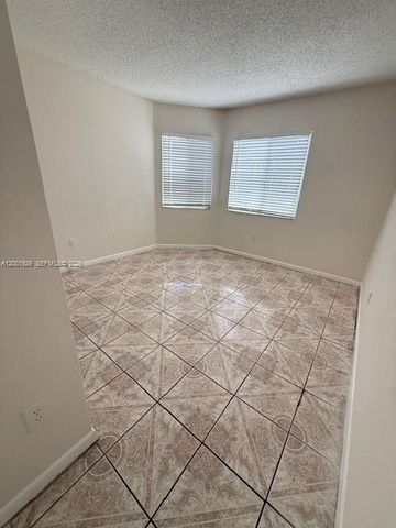 1034 W Jasmine Ln, North Lauderdale, FL 33068