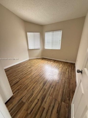 1034 W Jasmine Ln, North Lauderdale, FL 33068